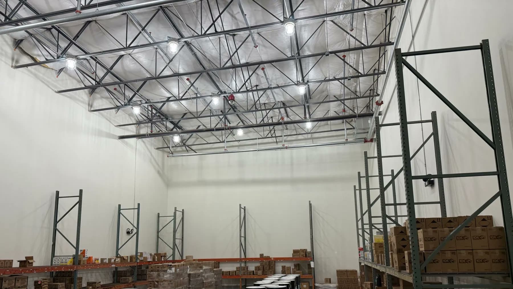 High-bay lighting installed in a commercial warehouse